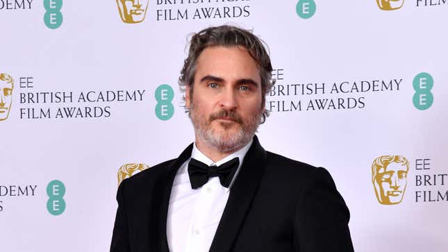 Joaquin Phoenix with his Best Actor award for “The Joker’ poses in the Winners Room during the EE British Academy Film Awards 2020 on February 02, 2020 in London, England. 