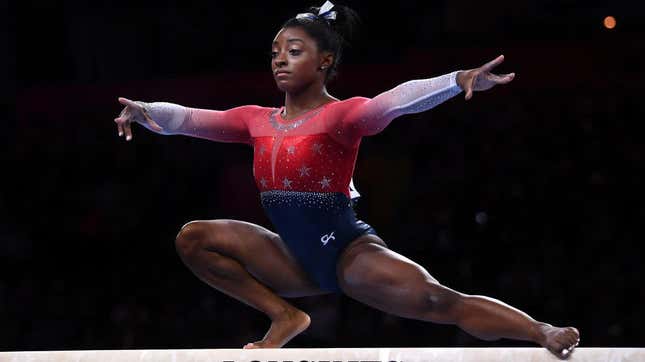  Simone Biles performs on the balance beam during the Women’s Team Finals at the gymnastics world championships Oct. 8, 2019, in Stuttgart, Germany. 