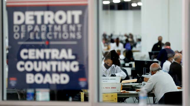 Election workers count absentee ballots for the 2020 general election at TCF Center on November 4, 2020 in Detroit, Michigan.