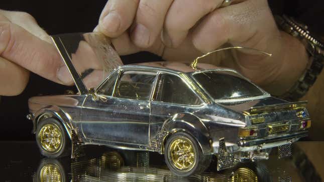 Image for article titled I Am So Here for This Tiny Ford Escort Model Made of $90,000 in Silver, Gold and Diamonds