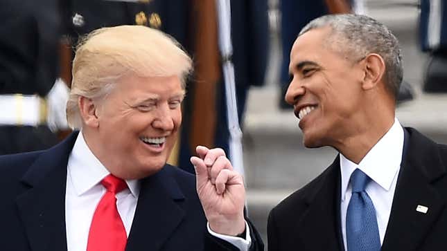 US President Donald Trump and former President Barack Obama talk after inauguration ceremonies on January 20, 2017.