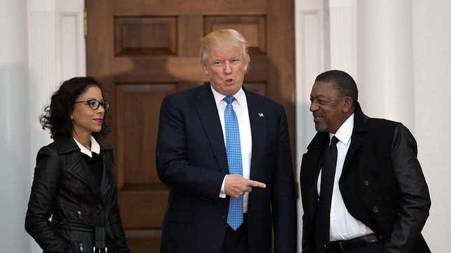  In this November 2016 photo, Donald Trump greets Robert Johnson (right), the founder of BET, and NFL executive Traci Otey Blunt as they arrive for a meeting with Trump at his Bedminster Township, N.J., golf club following Trump’s presidential election win.