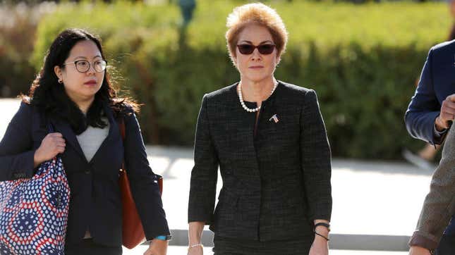 Former U.S. Ambassador to Ukraine Marie Yovanovitch (center) arrives at the U.S. Capitol Oct. 11, 2019, in Washington, D.C. Yovanovitch was invited to testify behind closed doors to the House Intelligence, Foreign Affairs and Oversight committees as part of the ongoing impeachment investigation against Donald Trump. 