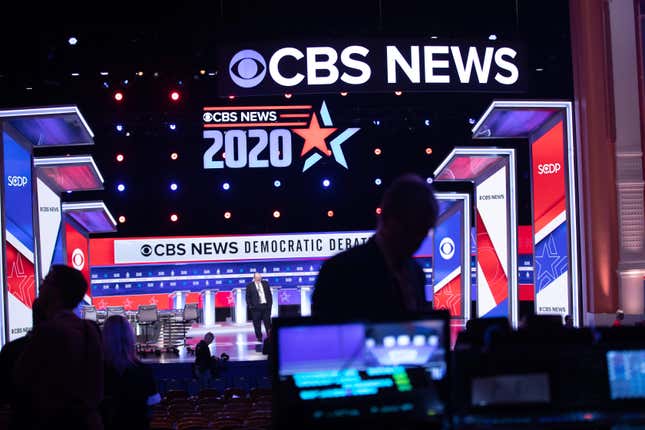 Staff from CBS News make final preparations on the Democratic National Committee Debate stage in Charleston, South Carolina, on February 25, 2020.