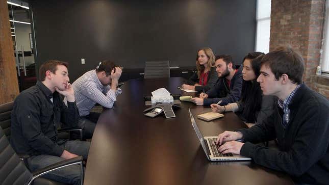 The recent intern group at Kapper Media eagerly listens as some of the company’s completely exhausted and unhappy employees answer their questions.
