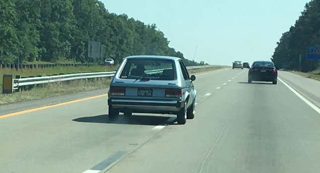 Image for article titled Help Me Understand the Mystery of the Sign of the Two Dodge Omnis, Good and Bad