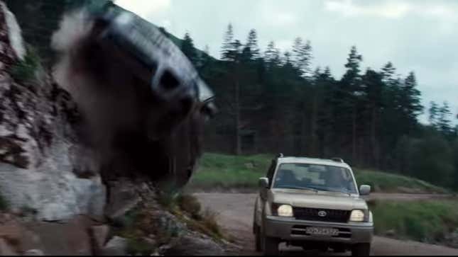 Image for article titled Old Toyota Survives The New James Bond Trailer While Shiny Land Rovers Get Mulched