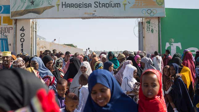 Muslim worshippers take pictures with their mobile phones after attending Eid al-Fitr prayers at the Hargeisa stadium in Hargeisa, the capital of the self-declared republic of Somaliland in northern Somalia, on June 4, 2019.
