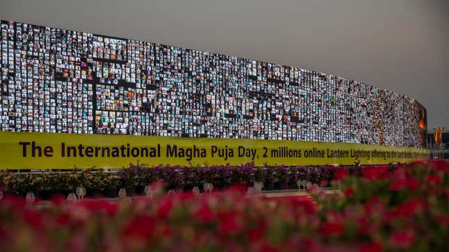 Image for article titled 200,000 Buddhists Gathered on a Giant Screen Via Zoom to Celebrate One of Their Holiest Days