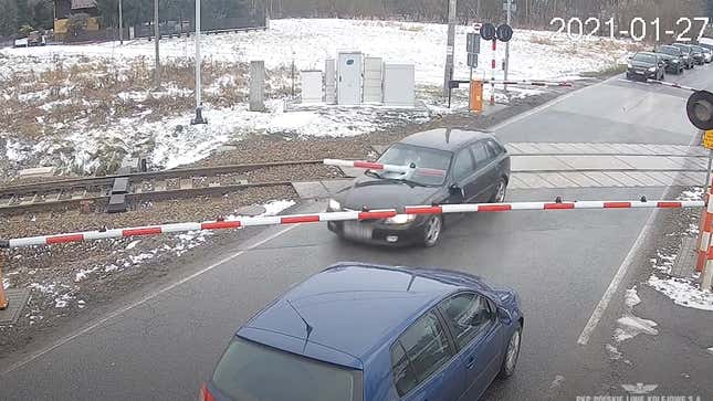 Image for article titled Driver Running From Police Almost Impales Himself On Railroad Crossing Barrier