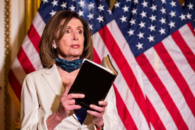 House Speaker Nancy Pelosi of Calif., reading from the Bible, reacts to President Donald Trump during a news conference at the U.S. Capitol in Washington, Tuesday, June 2, 2020.