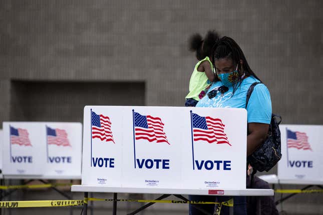 Voters cast fill out their ballot during Tuesdays Kentucky primary on June 23, 2020 in Louisville, Kentucky. 