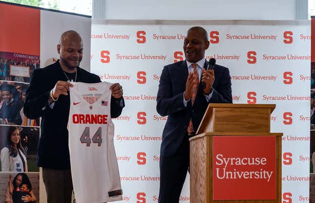 Kevin Richardson of the Exonerated Five receiving a custom jersey from Syracuse University.