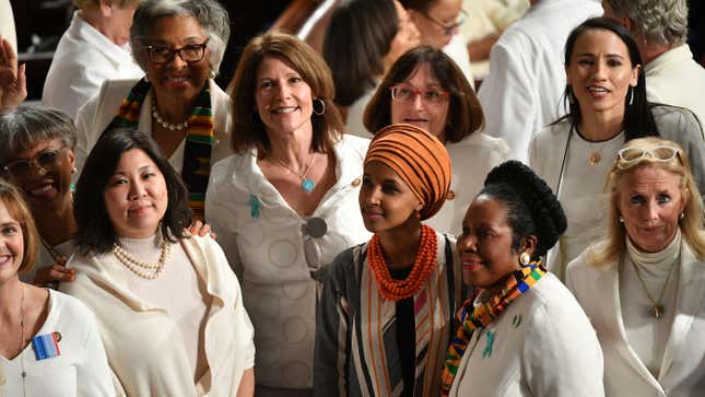 Rep. Ilhan Omar (D-Minn.) and Democratic members from the House of Representatives wearing white attend the State Of The Union address at the US Capitol in Washington, DC, on February 4, 2020.