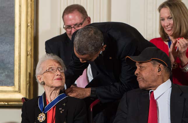 US President Barack Obama presents the Presidential Medal of Freedom to NASA mathematician and physicist Katherine Johnson at the White House in Washington, DC, on November 24, 2015.