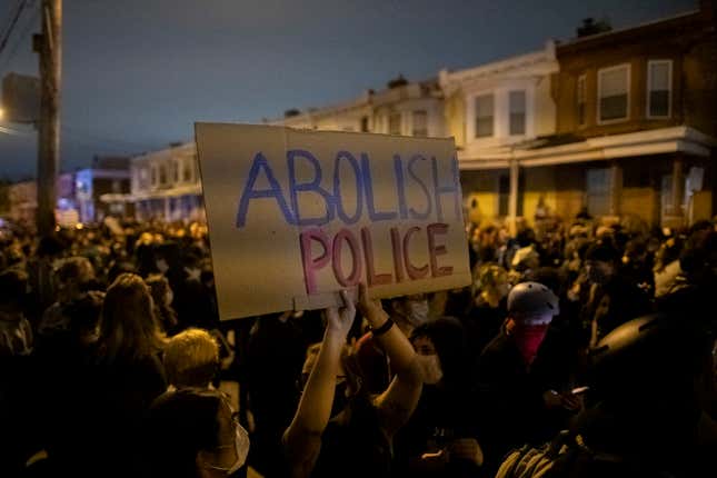 Image for article titled After Philadelphia Police Yank Woman Out of Her Car and Attack Her, Police Union Uses Her Son in Propaganda Photo