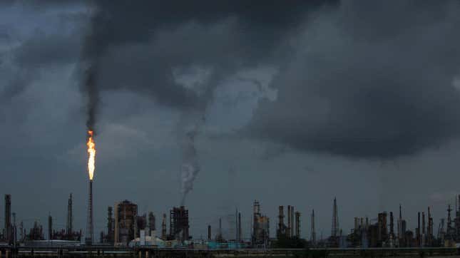  A gas flare from the Shell Chemical LP petroleum refinery illuminates the sky on August 21, 2019 in Norco, Louisiana. The plant agreed to install $10 million in pollution monitoring and control equipment in 2018 to settle allegations that flares used to burn off emissions were operating in violation of the Clean Air Act. 