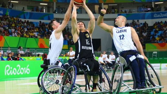 Ian Sagar of Great Britain and Alexander Halouski of Germany during Wheelchair basketball match Germany against Great Britain during Rio 2016 Paralympics at Carioca Arena 1 on September 11, 2016 in Rio de Janeiro.