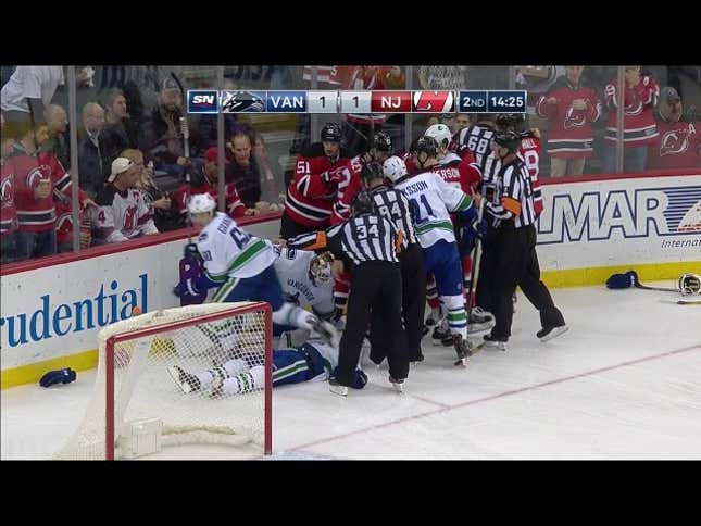 Devils And Canucks Brawl Right On Top Of Lifeless Philip Larsen