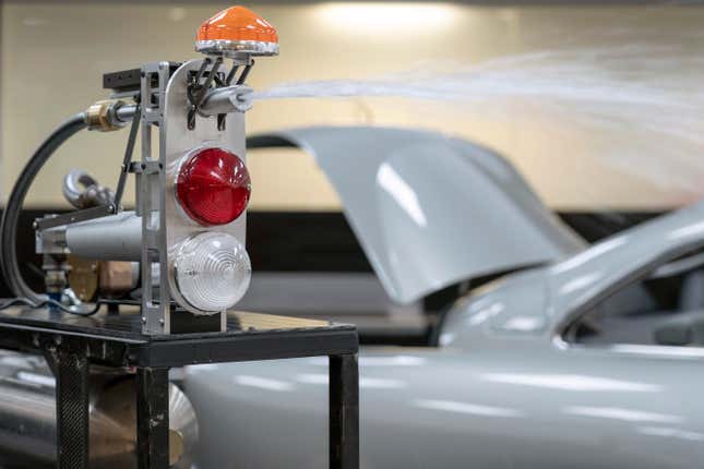Image for article titled How Movie Magic Made the Aston Martin Goldfinger DB5 Continuation’s Bond Gadgets a Reality