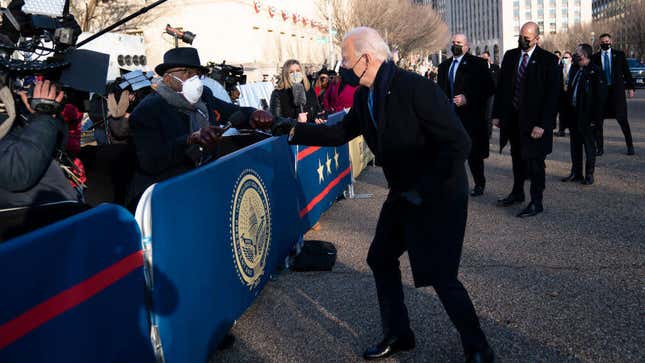 President Joe Biden talks with NBC anchor Al Roker as he and and First Lady Dr. Jill Biden walk along Pennsylvania Avenue in front of the White House during Inaugural celebrations on January 20, 2021 in Washington, DC.