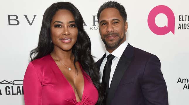 Kenya Moore, left, and Marc Daly attend the 26th annual Elton John AIDS Foundation’s Academy Awards Viewing Party at The City of West Hollywood Park on March 4, 2018 in West Hollywood, California. 