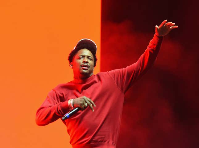 Image for article titled YG Boots Fan Off Stage for Refusing to Curse Out Donald Trump