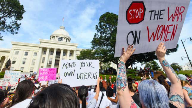  Protesters rally against one of the nation’s most restrictive bans on abortions on May 19, 2019, in Montgomery, Ala.