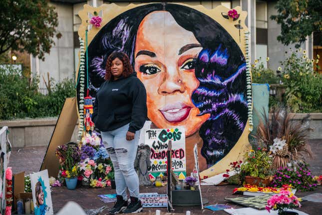 Tamika Palmer, mother of Breonna Taylor, poses for a portrait in front of a mural of her daughter at Jefferson Square park on September 21, 2020 in Louisville, Kentucky. Demonstrators gathered to prepare for possible unrest in wake of the Grand Jury decision regarding the officers involved in the killing of Breonna Taylor. Taylor was fatally shot by Louisville Metro Police officers during a no-knock warrant at her apartment on March 13, 2020 in Louisville, Kentucky. Demonstrators have occupied the park for 118 days. 