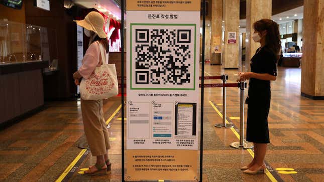 Instructions and QR code for SafeEntry contact tracing is displayed amid coronavirus at a Sejong Culture Center for ahead of musical ‘Mozart’ on July 21, 2020 in Seoul, South Korea.
