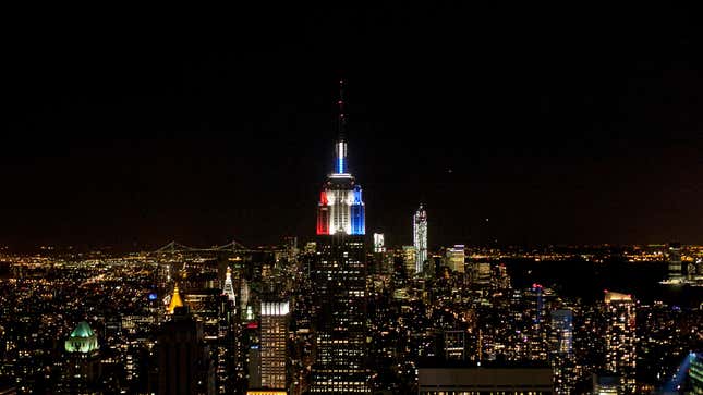 The Empire State Building is lit red, white, and blue.