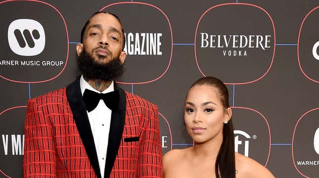 Nipsey Hussle and Lauren London arrive at the Warner Music Group Pre-Grammy Celebration on February 7, 2019 in Los Angeles, California.