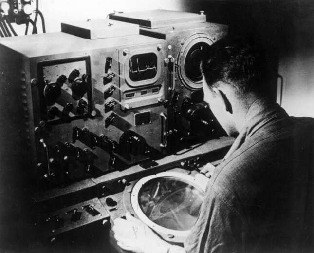 15th August 1945: A member of the navy runs a check on some experimental new military radar equipment at the naval air station in Anacostia, District of Columbia.