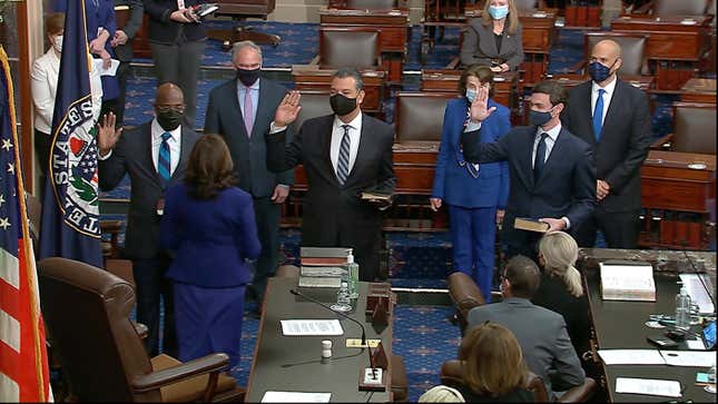 Vice President Kamala Harris swears in Sen. Raphael Warnock, D-Ga., Sen. Alex Padilla, D-Calif., and Sen. Jon Ossoff, D-Ga., on the floor of the Senate Wednesday, Jan. 6, 2021, on Capitol Hill in Washington.