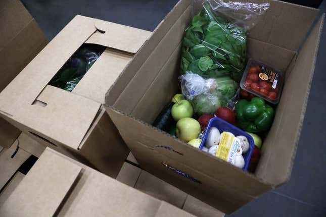 Content of a food box is seen during a tour at the distribution center of Coastal Sunbelt Produce May 15, 2020 in Laurel, Maryland.