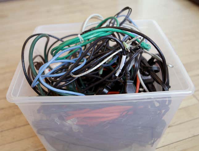 Image for article titled Jumbled Nest Of Cords Makes Move To Third New Apartment