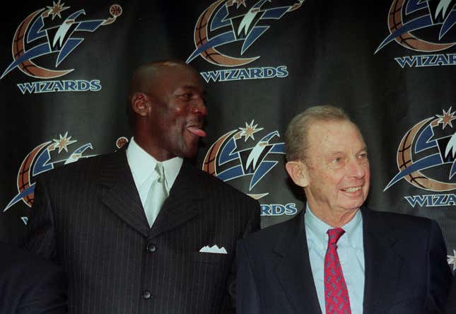 Michael Jordan with Abe Pollin after he signed with the Wizards in 2000. Getty
