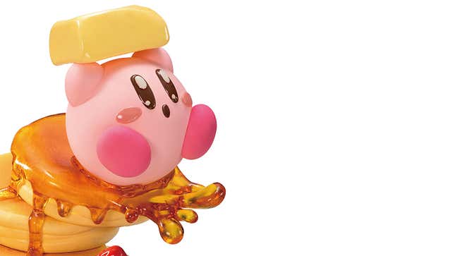 Image for article titled Here Is Kirby On Pancakes Brandishing A Stick Of Butter