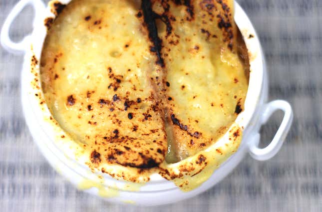 Image for article titled Cooking through Anthony Bourdain's Les Halles Cookbook must begin with French onion soup