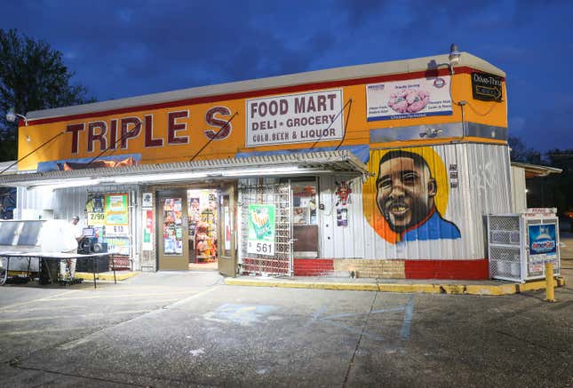 A mural in memory of Alton Sterling is displayed on the wall outside of Triple S Food Mart on March 27, 2018, in Baton Rouge, La. Louisiana Attorney General Jeff Landry announced today that the two officers involved in the July 2016 death of Alton Sterling would not face criminal charges. 