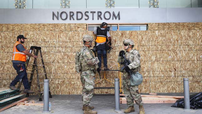 Image for article titled Boarded-Up Storefronts Are Not for Your Photo Opp