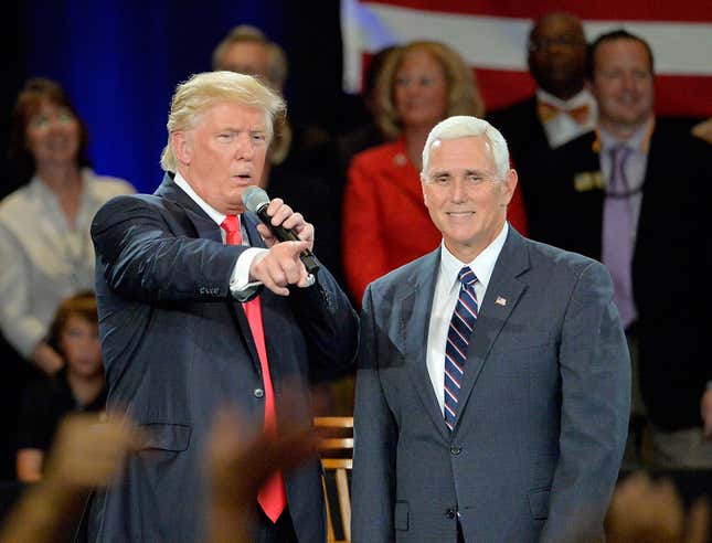 Then-candidates Donald Trump (L) and Mike Pence take questions from the audience at the Hotel Roanoke &amp; Conference Center on July 25, 2016, in Roanoke, Va. Trump made a point to address the evangelicals during his visit to the bible belt.