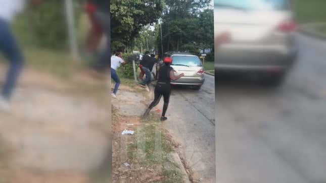 Lexus SUV Drives Over People Fighting In Street, No One Died But It's All So Depressing