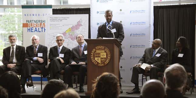 Carl Allamby (center) speaks to an audience at Cleveland State University. 