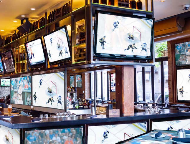 Image for article titled Sports Bar Makes More Room For TVs By Getting Rid Of Tables, Chairs, Bartenders, Customers