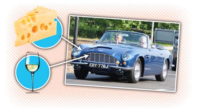 Image for article titled Somehow I Missed That The Prince Of Wales Drives An Aston Martin That Runs On Wine And Cheese