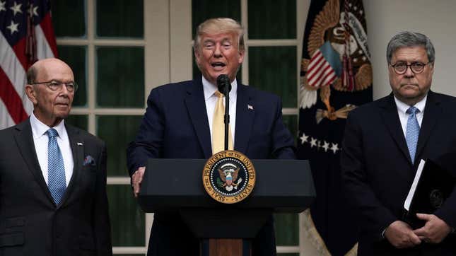 Donald Trump discusses the citizenship question and the 2020 census while flanked by Commerce Secretary Wilbur Ross (left) and Attorney General William Barr, in the Rose Garden of the White House, July 11, 2019.