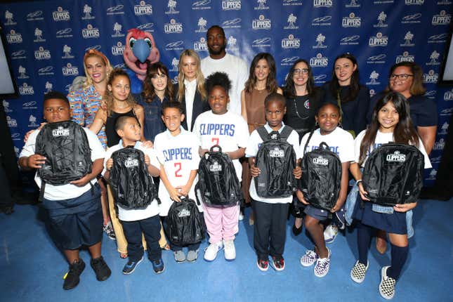 (L-R) Busy Philipps, Nicole Richie, Zooey Deschanel, Kelly Sawyer Patricof, Kawhi Leonard, Norah Weinstein, Cillian Zucker, Sophia Rossi, and Katherine Nelson celebrate donation of One Million backpacks from Baby2Baby, Kawhi Leonard and the L.A. Clippers to students across Los Angeles at 107th Street Elementary on Aug. 20, 2019, in Los Angeles.