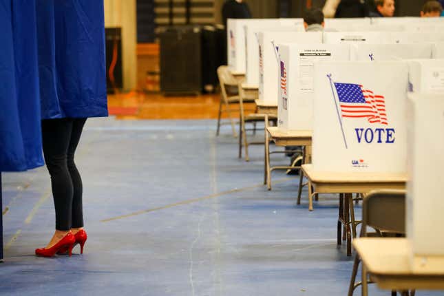 A voter casts a ballot at Bedford High School during the New Hampshire primary on February 11, 2020 in Bedford, New Hampshire.