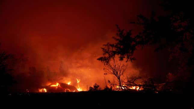 The Zogg burns a home along Platina Road in Igo, California on Sept. 27.